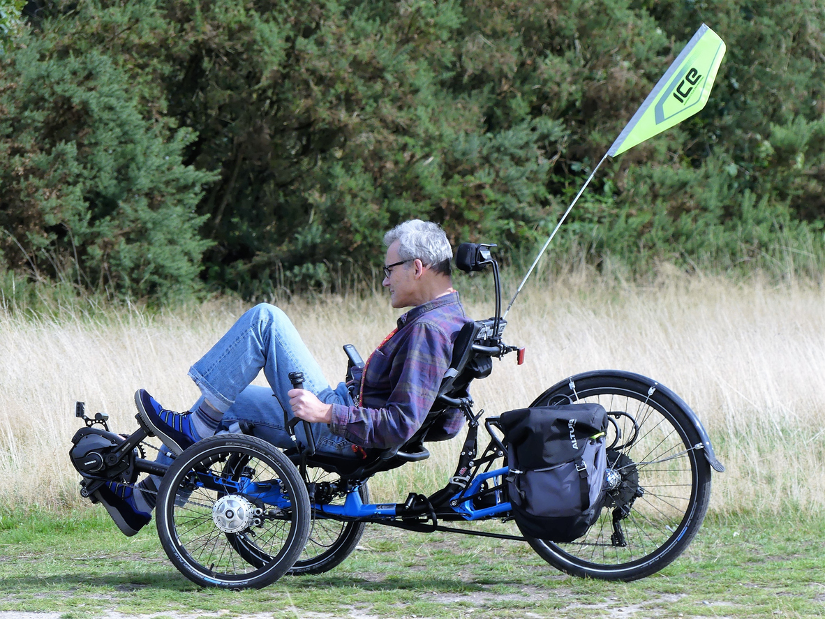Chorleywood, Hertfordshire, England, UK - August 21st 2019: Male person riding an ICE (Inspired Cycling Engineering) Adventure HD Recumbent Trike
